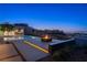 An outdoor pool with a fire pit and city views in the background at 6 Rock Mount Ct, Henderson, NV 89012