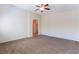 Expansive bedroom featuring plush carpeting and an ensuite bathroom at 6125 Paddleboat St, North Las Vegas, NV 89031