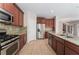 Spacious kitchen with stainless steel appliances, granite countertops, and plenty of cabinet space at 6125 Paddleboat St, North Las Vegas, NV 89031