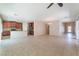Open floor plan with living area, dining space, and kitchen featuring stainless steel appliances at 6125 Paddleboat St, North Las Vegas, NV 89031