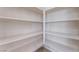 Well-organized walk-in pantry with ample shelving for storage at 6125 Paddleboat St, North Las Vegas, NV 89031