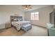 Cozy bedroom with natural light and neutral decor at 617 Sylvan St, Henderson, NV 89002