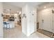 Bright entryway leading to an open-concept kitchen with tile flooring at 617 Sylvan St, Henderson, NV 89002