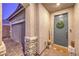 Charming front porch with a decorative wreath and fall-themed decorations at 617 Sylvan St, Henderson, NV 89002