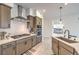 Contemporary kitchen showcasing stainless steel appliances, a gas cooktop, and sleek countertops at 617 Sylvan St, Henderson, NV 89002