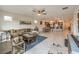 Spacious living room open to the kitchen and dining area, perfect for Gathering gatherings and entertaining guests at 617 Sylvan St, Henderson, NV 89002