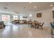 Spacious living room with tile flooring, and access to the kitchen at 617 Sylvan St, Henderson, NV 89002