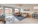 Comfortable living room with sliding glass doors to the backyard at 617 Sylvan St, Henderson, NV 89002