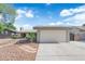 Charming single-story home featuring a two car garage and low maintenance desert landscaping at 6791 Greengrove Dr, Las Vegas, NV 89103