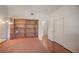 Bedroom featuring hardwood floors, a closet with sliding doors, and a decorative wooden bookshelf at 689 Bay View Dr # 1311, Boulder City, NV 89005