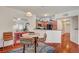 Open dining area with kitchen views, modern lighting, and stylish decor, great for entertaining guests at 689 Bay View Dr # 1311, Boulder City, NV 89005