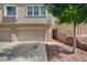 Attached two-car garage, providing convenient parking and additional storage space at 689 Bay View Dr # 1311, Boulder City, NV 89005