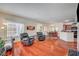 Open-concept living space with hardwood floors, offering seamless flow to the kitchen and dining areas at 689 Bay View Dr # 1311, Boulder City, NV 89005