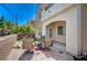 Paver patio offers comfortable seating and access to the home and outdoor green space at 689 Bay View Dr # 1311, Boulder City, NV 89005