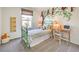 bedroom with playful decor, including a whimsical monkey-themed wall decal and cozy furnishings at 6928 Wrightshire St # 19, Las Vegas, NV 89166