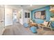 Upstairs loft area featuring comfortable seating, stylish decor, and a relaxed atmosphere for leisure and entertainment at 6928 Wrightshire St # 19, Las Vegas, NV 89166