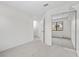 Light-filled bedroom with sliding closet doors and en-suite bathroom access at 6997 Ray Charles Ln, Las Vegas, NV 89119