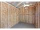 Interior view of shed revealing lumber framing and sheeting at 6997 Ray Charles Ln, Las Vegas, NV 89119