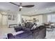 Stylish open-concept space that combines a living room, dining area and kitchen, perfect for entertaining at 7061 Tilligerry St, North Las Vegas, NV 89084