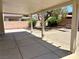 Outdoor patio with desert landscaping, providing a relaxing space for outdoor activities at 7615 Paso Robles Ave, Las Vegas, NV 89113