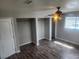 Bedroom with wood flooring, closet and ceiling fan at 781 Buol Rd, Pahrump, NV 89048