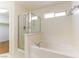 Bathroom featuring a shower and a tub at 7923 Homer Ct, Las Vegas, NV 89139