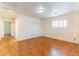 This is a spacious bedroom with wood flooring and a large window at 7923 Homer Ct, Las Vegas, NV 89139