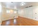 This is a large loft area with wood flooring and a closet for storage at 7923 Homer Ct, Las Vegas, NV 89139
