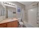 Well-lit bathroom featuring a single sink vanity and a shower-tub combination at 8128 Devils Canyon St, North Las Vegas, NV 89085