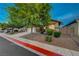 Well-maintained single-story home with a two-car garage, landscaped front yard, and inviting curb appeal at 8128 Devils Canyon St, North Las Vegas, NV 89085