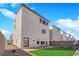 Backyard features artificial grass, low-maintenance desert landscaping, and an outdoor patio area at 8178 Eaton Hill St, Las Vegas, NV 89113