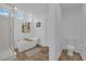 Bright bathroom with soaking tub, glass shower and toilet at 8178 Eaton Hill St, Las Vegas, NV 89113
