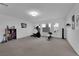 Spacious bonus room with carpet, recessed lighting, and windows, perfect for a home gym or entertainment area at 8178 Eaton Hill St, Las Vegas, NV 89113