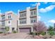 Modern three-story home with a rooftop deck, featuring clean architectural lines and thoughtful landscaping at 8178 Eaton Hill St, Las Vegas, NV 89113