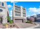 Contemporary three-story home with rooftop terrace, neat front yard, and paved driveway at 8178 Eaton Hill St, Las Vegas, NV 89113