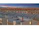 Aerial view showcasing the illuminated rooftops and the dazzling city skyline at night at 8178 Eaton Hill St, Las Vegas, NV 89113