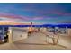 Enjoy mountain views from the rooftop deck complete with an umbrella, seating, and a hammock at 8178 Eaton Hill St, Las Vegas, NV 89113