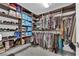 Spacious walk-in closet with shelves and racks for ample storage at 8178 Eaton Hill St, Las Vegas, NV 89113