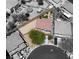 Aerial view of a home showcasing the backyard, landscaping, and surrounding neighborhood at 8682 Gateway Glen Dr, Las Vegas, NV 89178