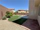 Turf backyard with patio at 8682 Gateway Glen Dr, Las Vegas, NV 89178