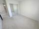 This bedroom offers ample space and a mirrored closet at 8682 Gateway Glen Dr, Las Vegas, NV 89178
