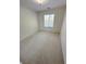 Neutral carpeted bedroom with natural light at 8682 Gateway Glen Dr, Las Vegas, NV 89178