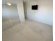 A cozy bedroom with a ceiling fan and TV at 8682 Gateway Glen Dr, Las Vegas, NV 89178