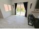 Bright dining area with backyard access and counter seating at 8682 Gateway Glen Dr, Las Vegas, NV 89178