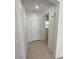 Bright foyer featuring tiled floors, neutral walls, and access to the main living areas at 8682 Gateway Glen Dr, Las Vegas, NV 89178