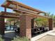 Well-maintained picnic shelter with sturdy stone columns, providing shaded seating for outdoor enjoyment at 8682 Gateway Glen Dr, Las Vegas, NV 89178