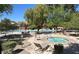 Community pool with outdoor seating at 8682 Gateway Glen Dr, Las Vegas, NV 89178