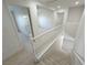 Carpeted staircase with white railing leading to the upper level at 8682 Gateway Glen Dr, Las Vegas, NV 89178