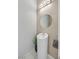 Modern powder room with a vessel sink, wavy tile accent wall, and sleek design at 881 Barrhead Ave, Henderson, NV 89012