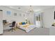Bright bedroom with modern decor, a workspace, and ample natural light, ideal for comfort and productivity at 881 Barrhead Ave, Henderson, NV 89012